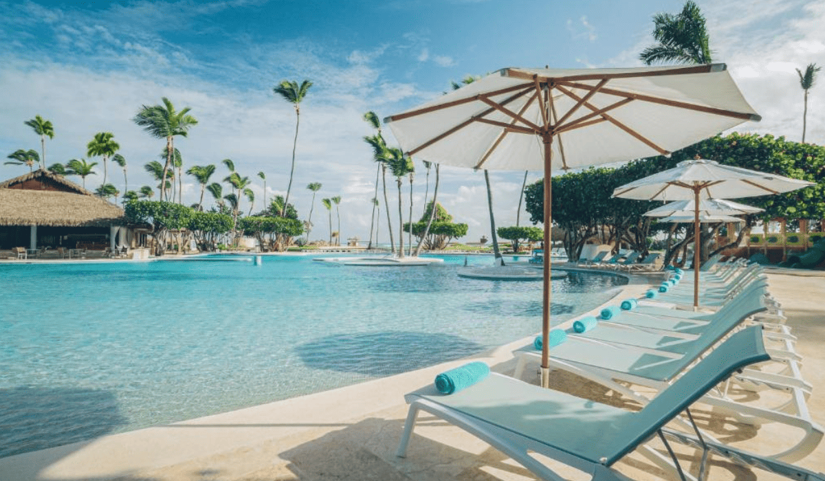 Spacious pool with relaxing loungers in Iberostar Selection Bavaro Punta Cana